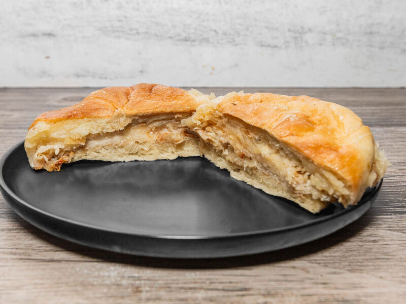 The Chris or George sandwich: turkey, crispy onions and melted cheese on a roll